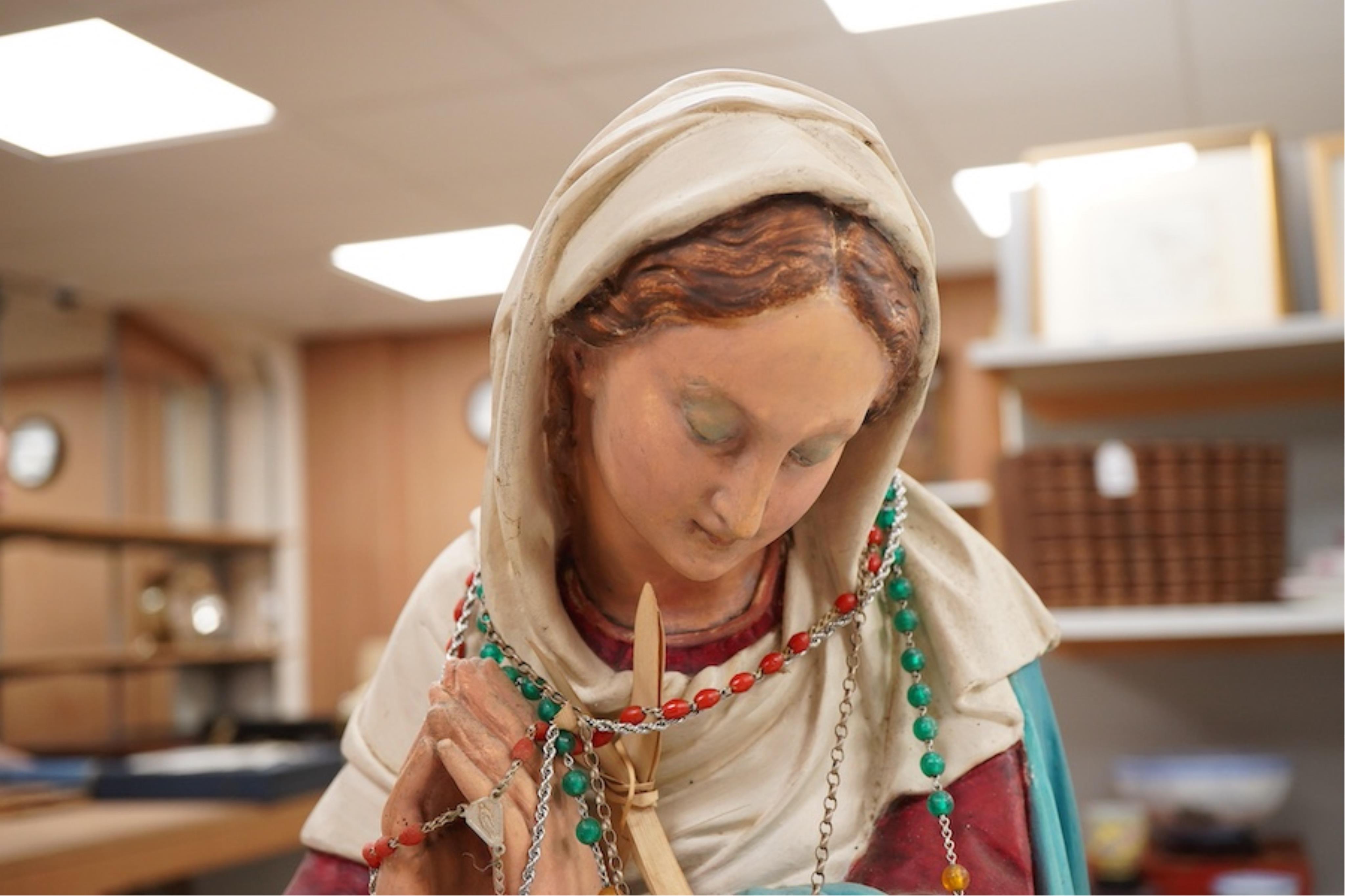A plaster figure of Madonna at prayer, 61cm